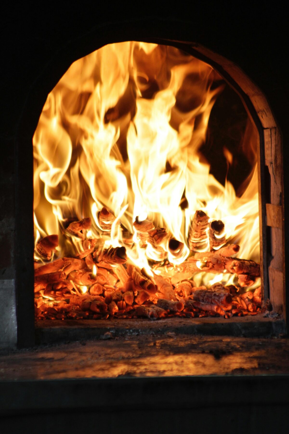 Dusty residential furnace burner that needs a cleaning